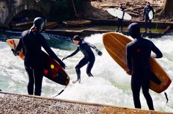 River surfers